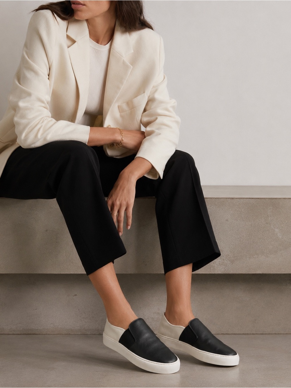 CHANEL Black and White Leather Slip-On Sneakers